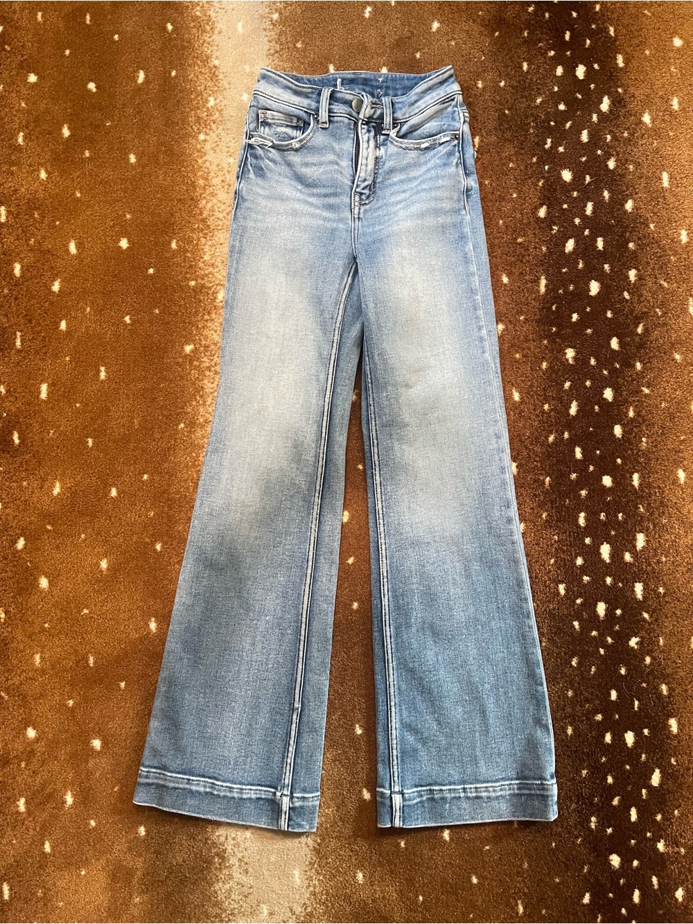 Women’s BKE flared wide leg high waisted size 24/29 jeans.